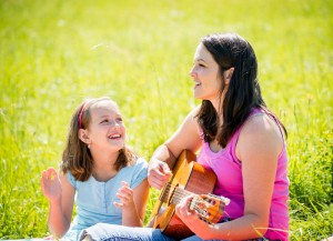 Woman playing guitar